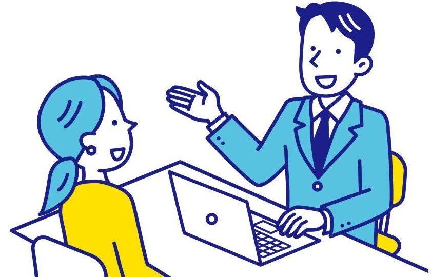 女性社員と面談を行う男性社員