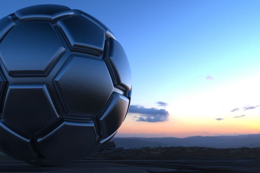 メタリックシルバーサッカーボールと夕焼け